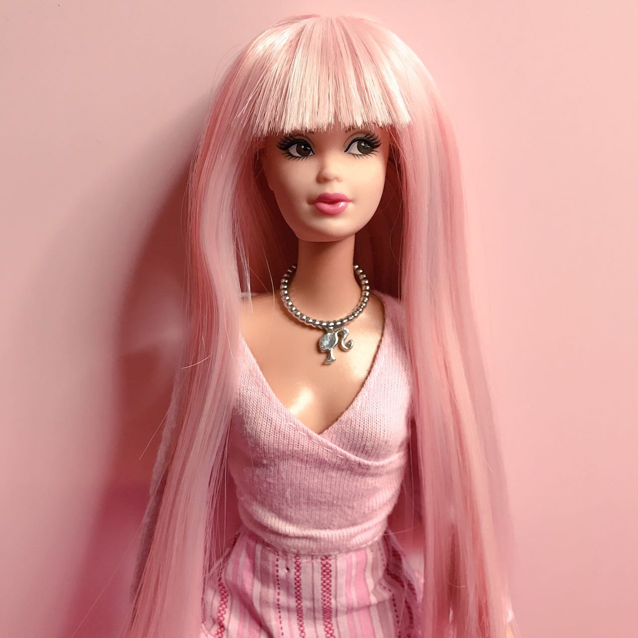 barbie pink hair doll